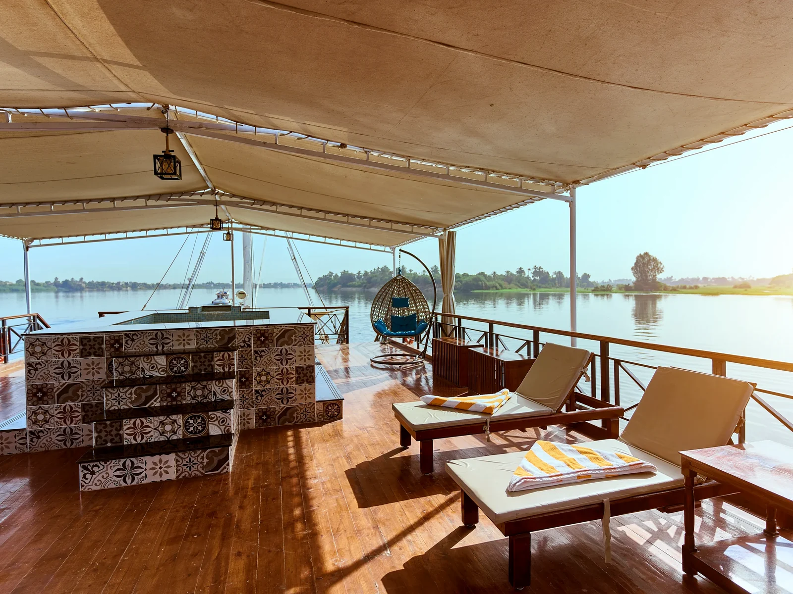 Small dipping pool and shaded seating on Fatima Dahabeya sun deck