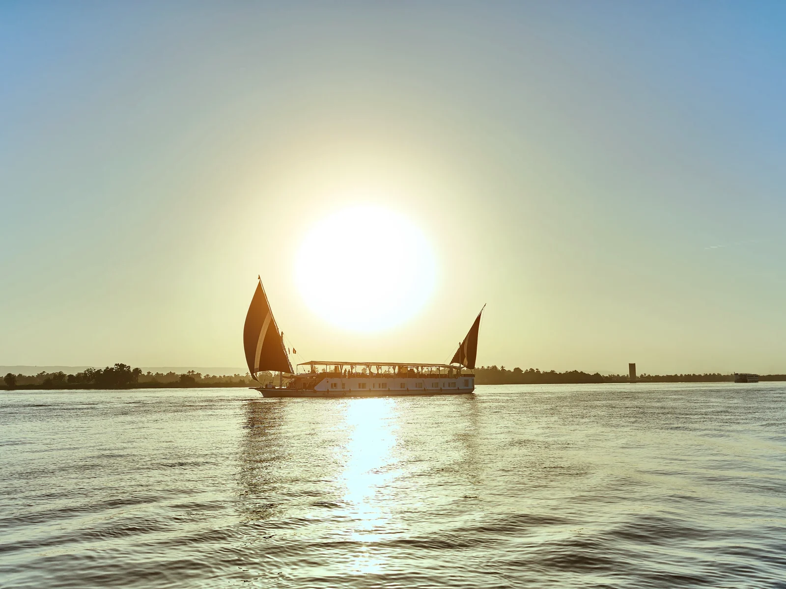 Fatima Dahabeya sailing at sunset on the Nile