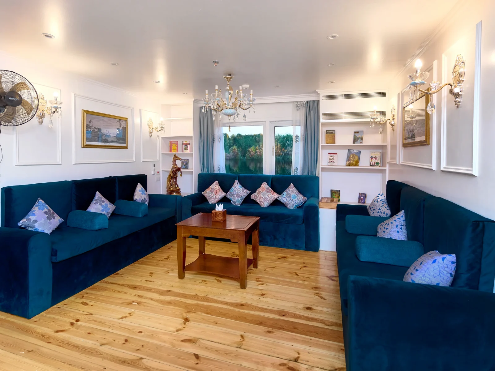 Blue sofa seating inside the Fatima Dahabeya salon
