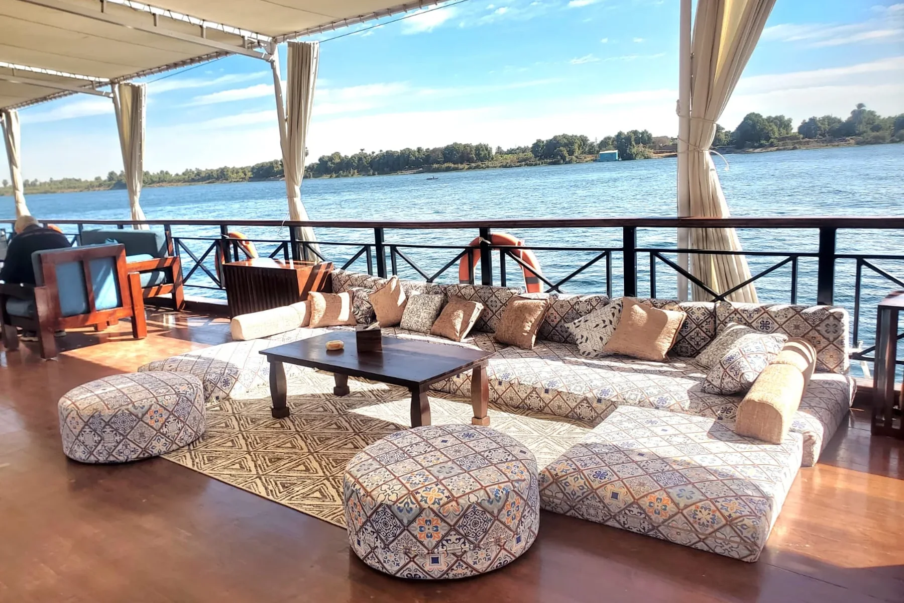 Shaded sun deck seating aboard Fatima Dahabeya