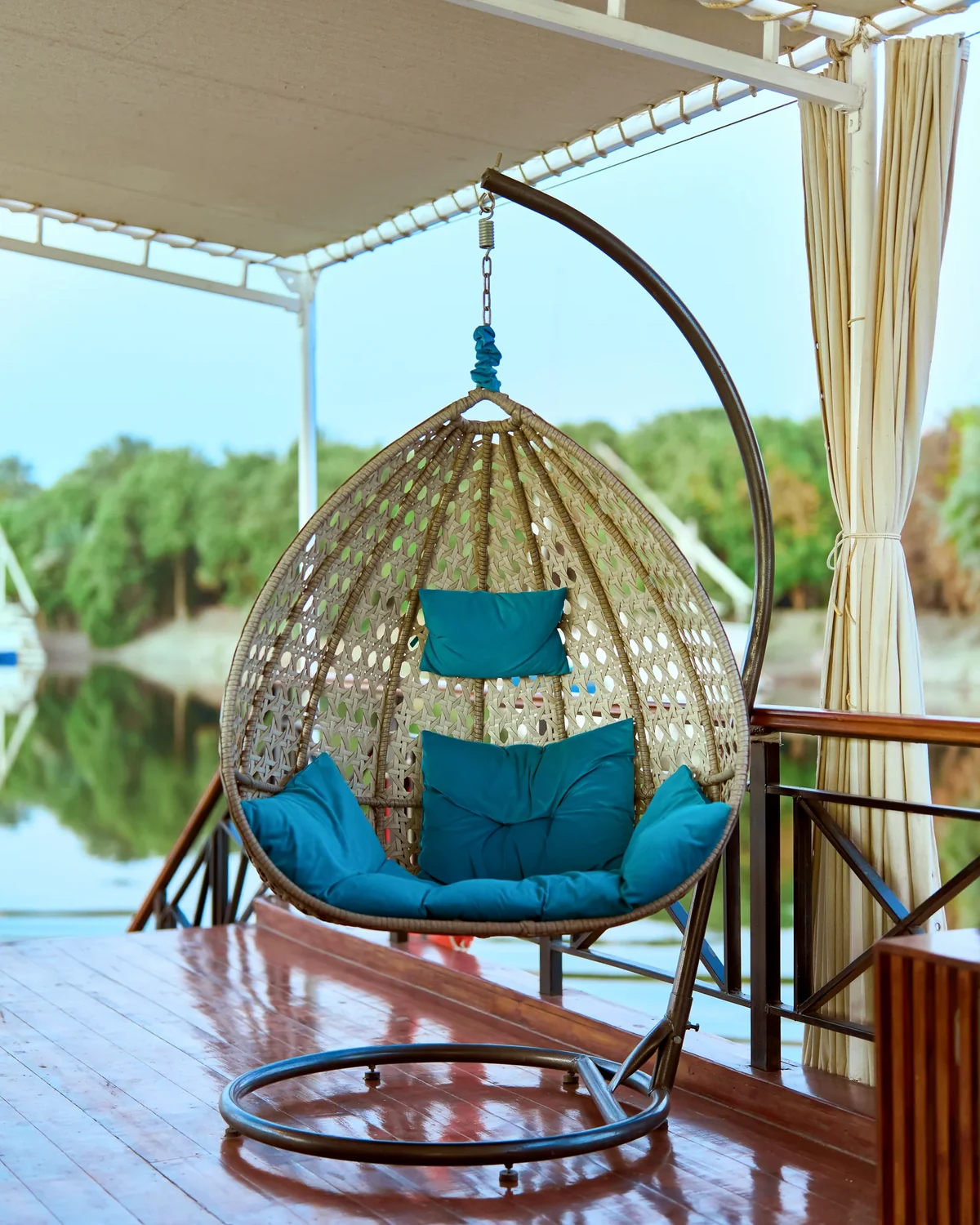 Hanging chair and shaded lounge on the Fatima Dahabeya sun deck