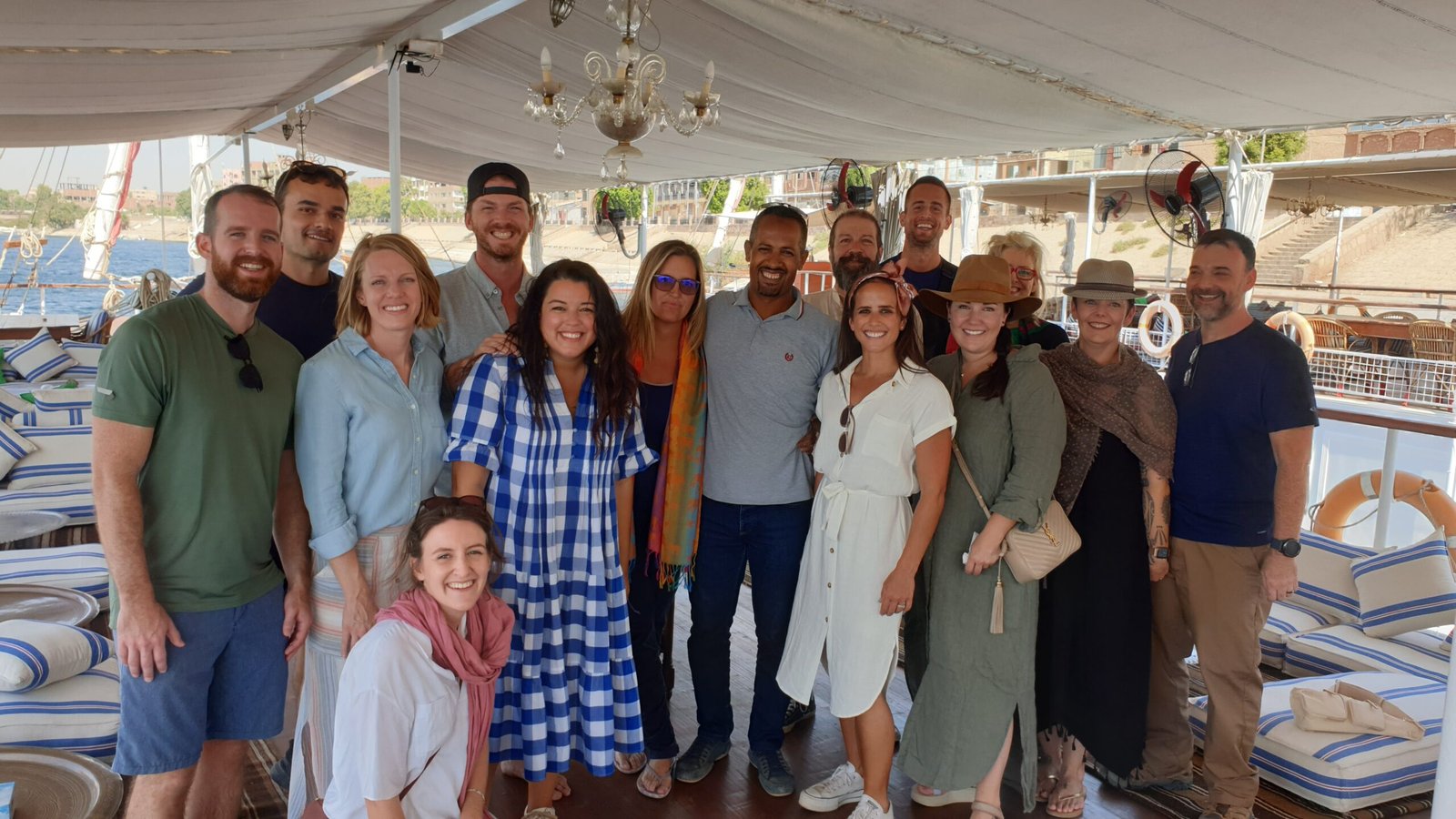 Guests and Egyptian hosts sharing an evening aboard Fatima Dahabeya